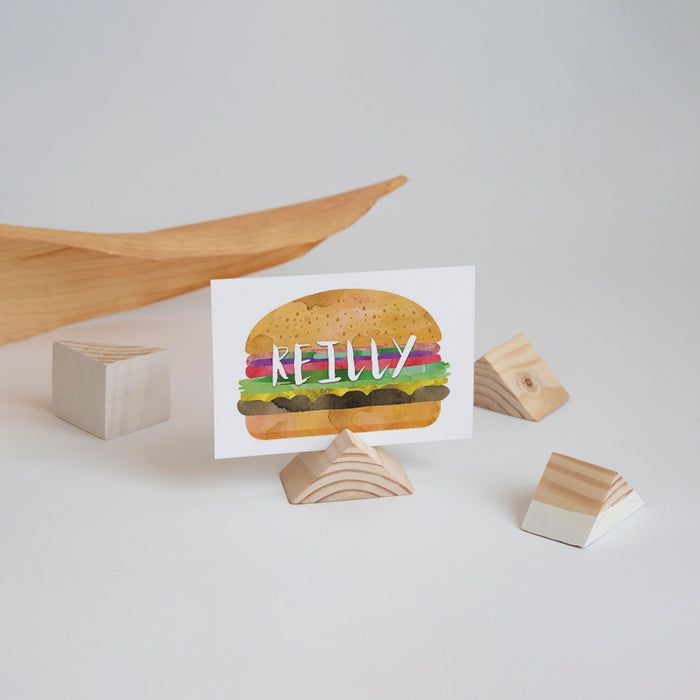 a name place card with a hamburger on it