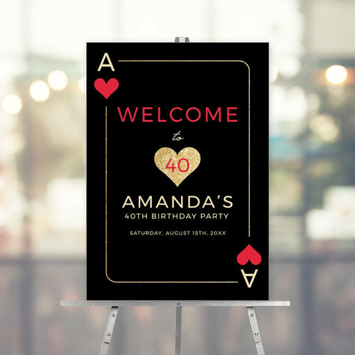 a black and gold playing card birthday party sign
