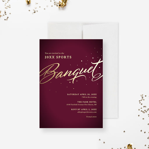 a red and gold banquet card with gold confetti