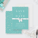 a teal-colored invitation card with a white ribbon and bow, along with a gift box and a fork on a white surface.