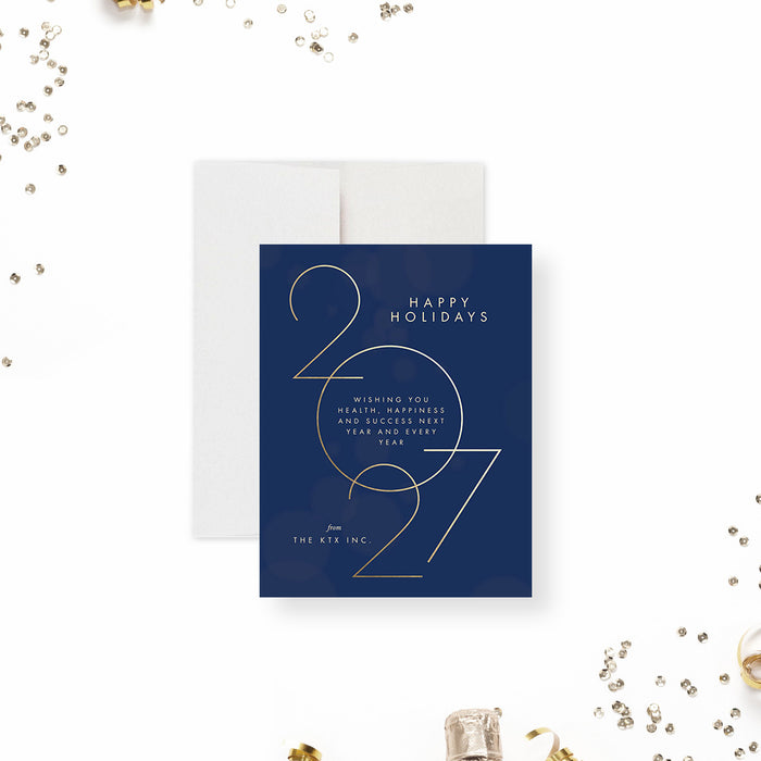 Navy blue 2027 holiday card with gold text on a white background with decorative elements.