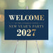 Navy blue sign with gold text for New Year's Party 2027