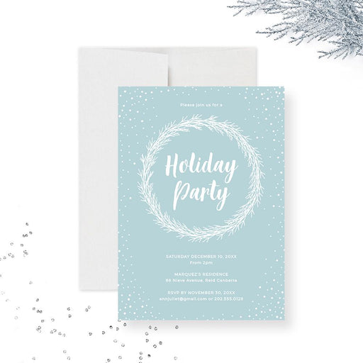 Minimalist blue holiday invitation featuring a white wreath and snowfall border with modern text for a winter Christmas party.