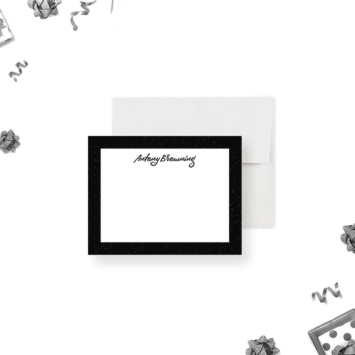 Personalized note card with a white front with a bold black border and personalized script name. Shown with a white envelope.