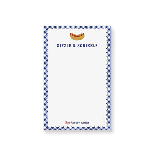 “Sizzle and Scribble” personalized notepad with blue gingham border and hot dog illustration