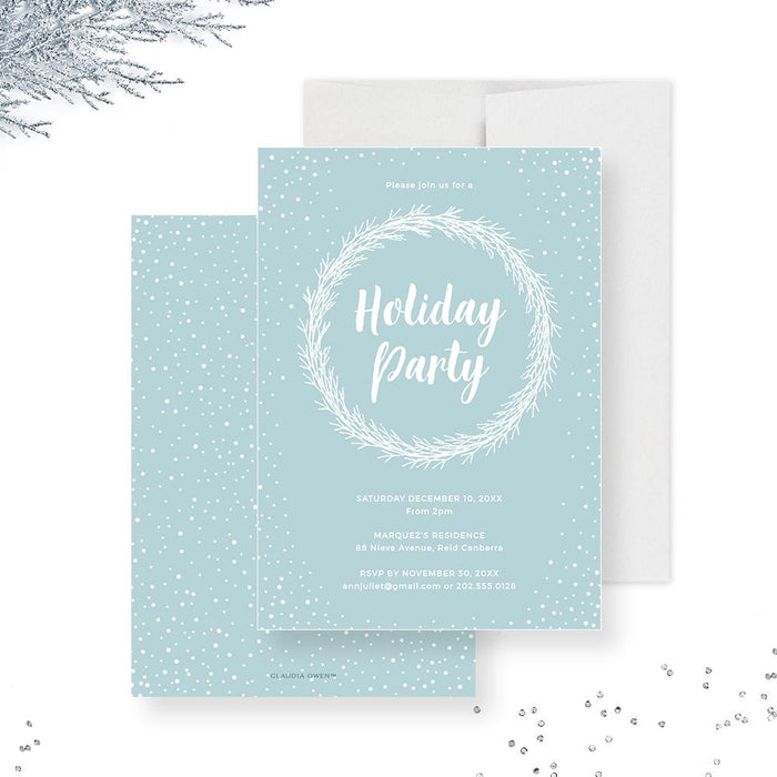 Minimalist blue holiday invitation featuring a white wreath and snowfall border with modern text for a winter Christmas party.