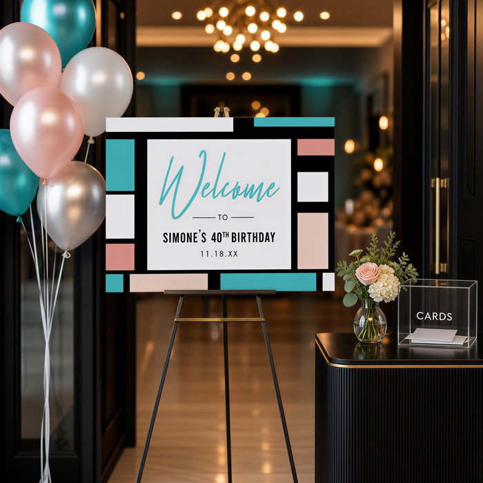 a colorful sign welcoming guests to a birthday celebration for someone named Simone. The sign is displayed on an easel, with balloons and a vase of flowers nearby.