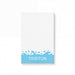 A white notepad with the word "TRISTON" written in blue text at the bottom.
