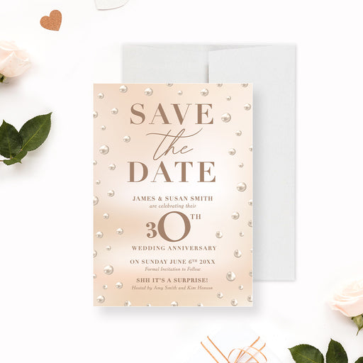 a save the date card with pearls on it