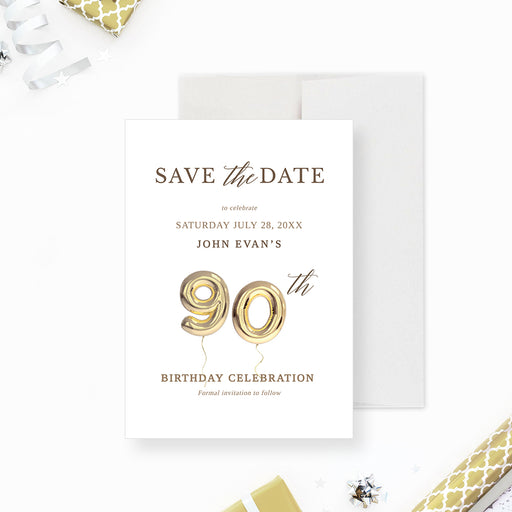 a white and gold 90th birthday party save the date card