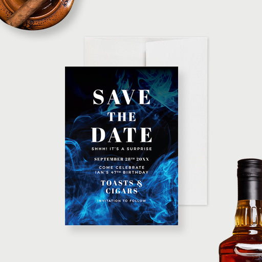 a save the date card with a smoky blue design