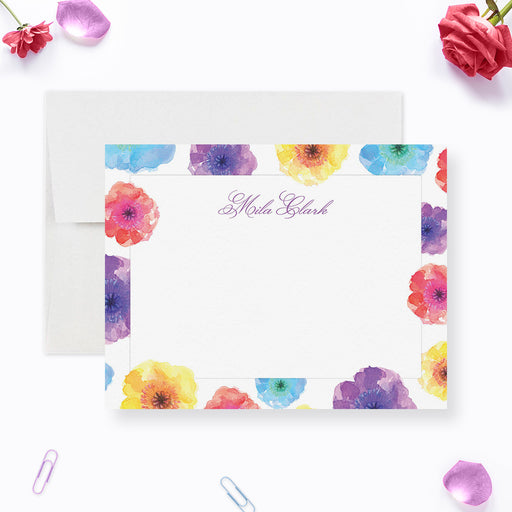 Personalized floral note card with colorful watercolor flowers and elegant name in script.

