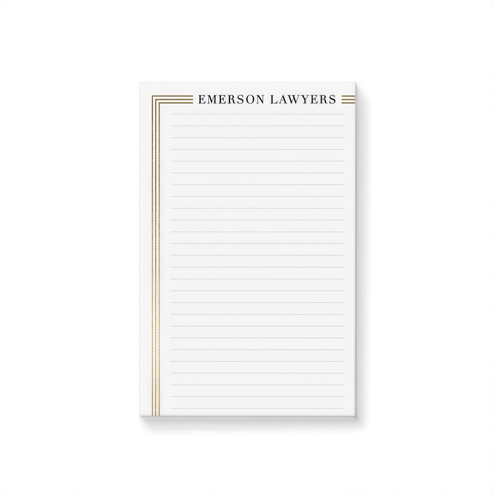 A blank lined notepad with the name 'EMERSON LAWYERS' printed on it.