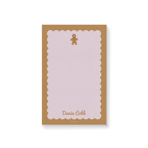 a pink and brown gingerbread notepad