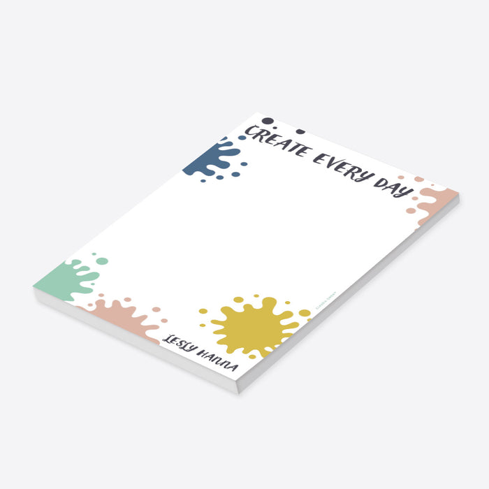 Personalized Create Every Day art-themed notepad with a colorful paint-splatter design and a custom name.-side
