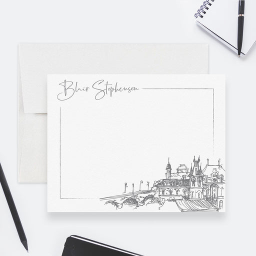 Artistic note card featuring a sketch of a mediterranean village with personalized name