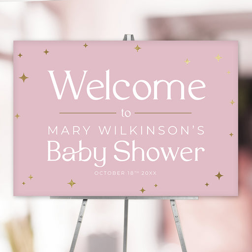 Baby girl shower welcome sign with blush background and gold sparkles