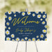 Custom baby shower welcome sign featuring cheerful white daisies against a navy background, ideal for spring and summer party entrances.