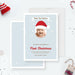 Baby’s first Christmas card featuring a cute baby photo framed with a Santa hat, light blue snowy background, and red festive text.