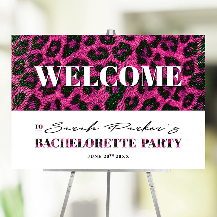 Bachelorette welcome sign with a pink leopard-print design, displayed as party entrance décor
