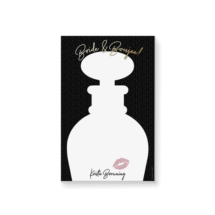 Personalized bachelorette notepad featuring perfume bottle silhouette with a pink lip print on a black geometric background with "Bride and Boujee" gold text.