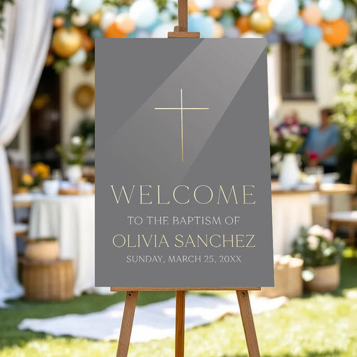 baptism welcome sign with cross detail, custom name, elegant neutral design, and christening celebration wording displayed on an easel