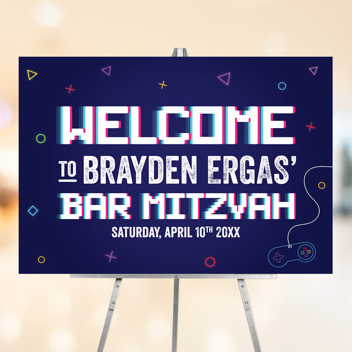 Gamer bar mitzvah welcome sign with pixel-style text, bright neon gaming icons, and dark blue video game theme design.