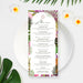 Menu card with tropical leaf design on a white plate with flowers and leaves.