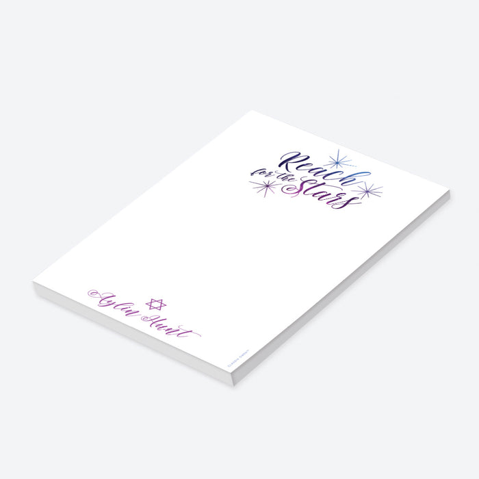 Personalized notepad with “Reach for the Stars” in purple and blue, featuring a Star of David design.-side