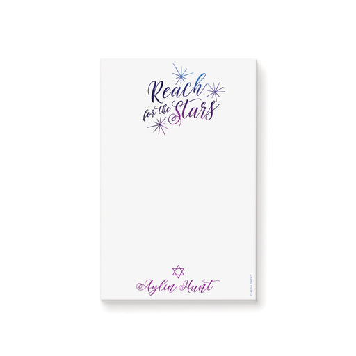 Personalized notepad with “Reach for the Stars” in purple and blue, featuring a Star of David design.