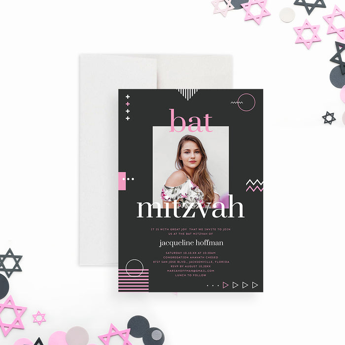 Modern bat mitzvah invitation featuring a photo and geometric design in a pink, gray, and white color scheme-front