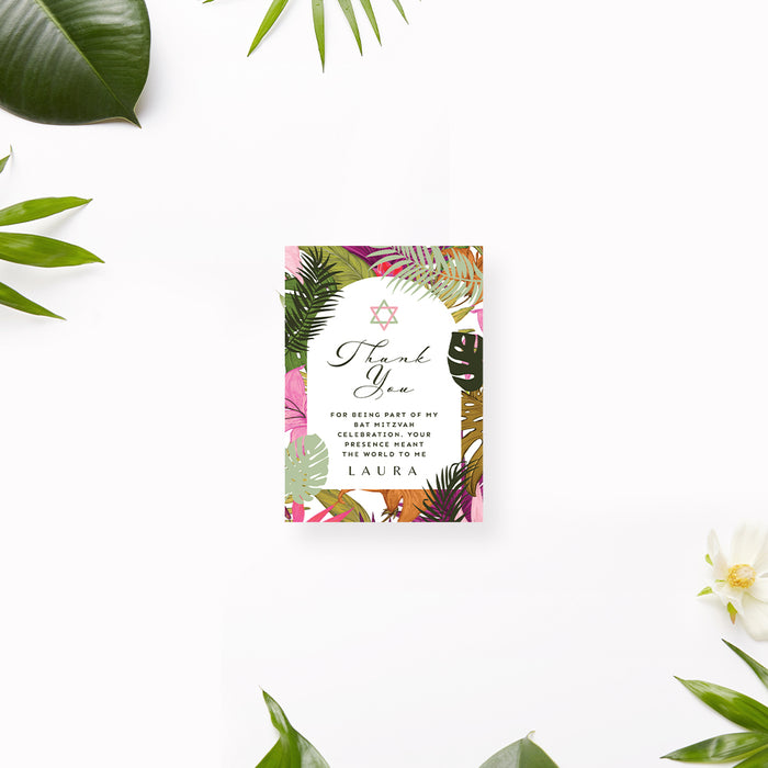 Thank you tag with tropical design and text on a white background with green leaves.