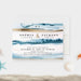 beach destination wedding invitation with blue ocean wave artwork, sand-toned accents, monogram, and coastal wedding details-front