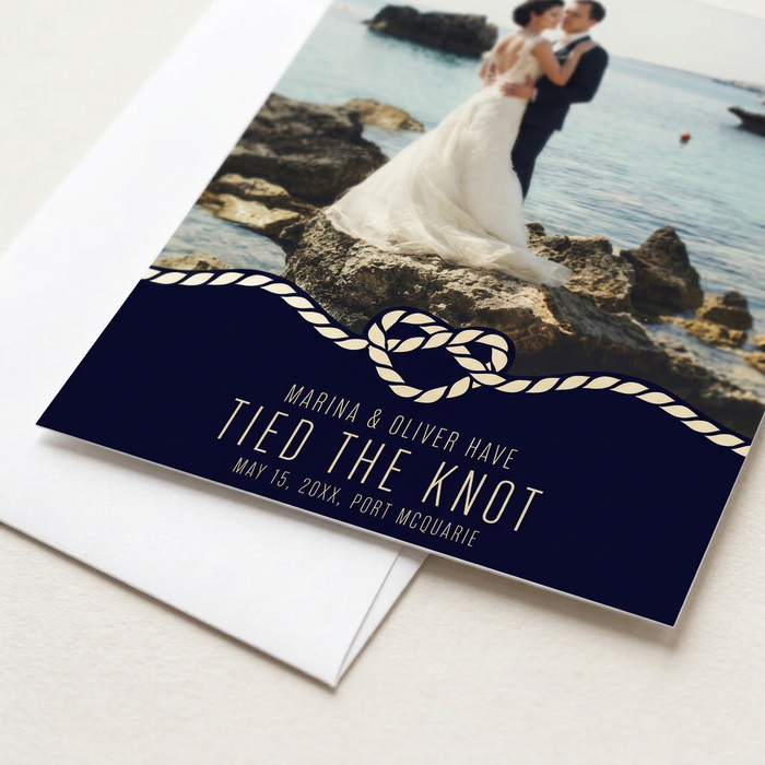 Beach wedding announcement close-up