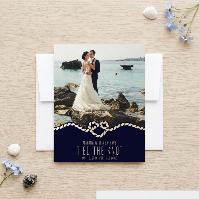 Beach wedding announcement flat lay