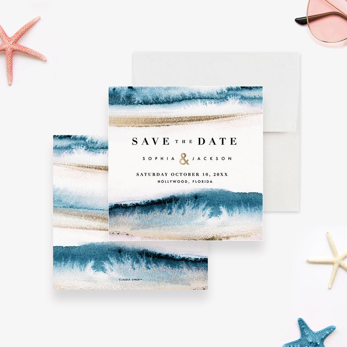 beach wedding save the date card with blue ocean wave artwork, sand-toned accents, and simple coastal wedding lettering-front-back