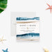 beach wedding save the date card with blue ocean wave artwork, sand-toned accents, and simple coastal wedding lettering-front