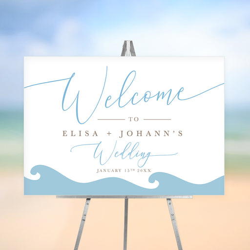 Beach wedding welcome sign featuring hand-drawn blue ocean waves and personalized couple names.