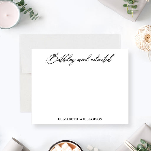 Personalized birthday note card with modern script reading “Birthday mood activated,”-front