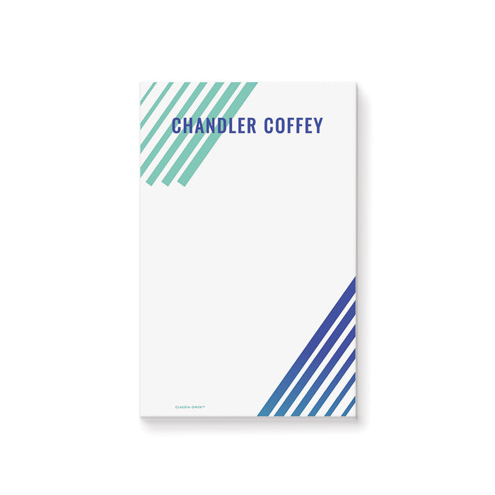 Personalized notepad featuring teal and navy diagonal stripes, with a custom name in bold navy text, designed in a modern stationery style.