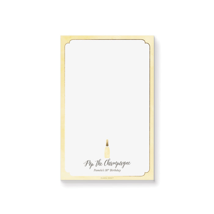 Elegant “Pop the Champagne” personalized notepad featuring a champagne bottle design, a perfect stationery souvenir for 30th, 40th, and 50th birthdays.