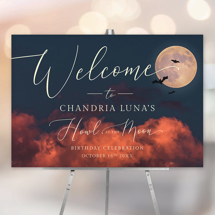 Howl at the Moon birthday welcome sign featuring a glowing full moon, flying bats, orange clouds, and custom birthday details for a spooky celebration.
