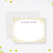 Personalized note card with a white front with a printed gold confetti border and personalized business name. Shown with a white envelope.