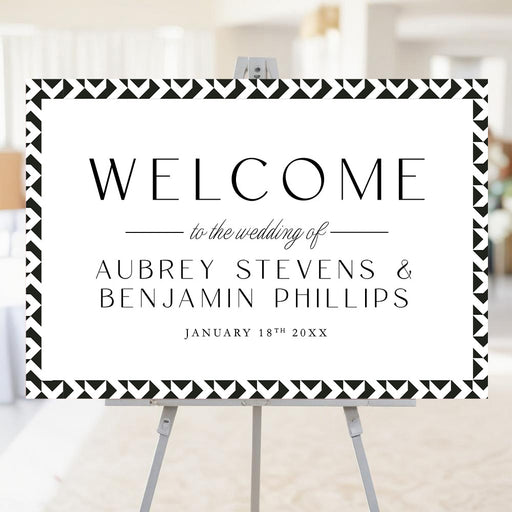 Modern black and white geometric wedding welcome sign with personalized names and date