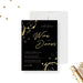 Black corporate wine dinner invitation with gold wine glass ring accents, script lettering and personalized business event details-front