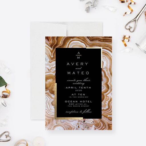 Black and gold geode wedding invitation featuring a modern elegant layout with natural stone texture-front