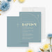 Blue baptism invitation with gold cross featuring a modern minimalist layout and elegant typography for a christening celebration.-front-back