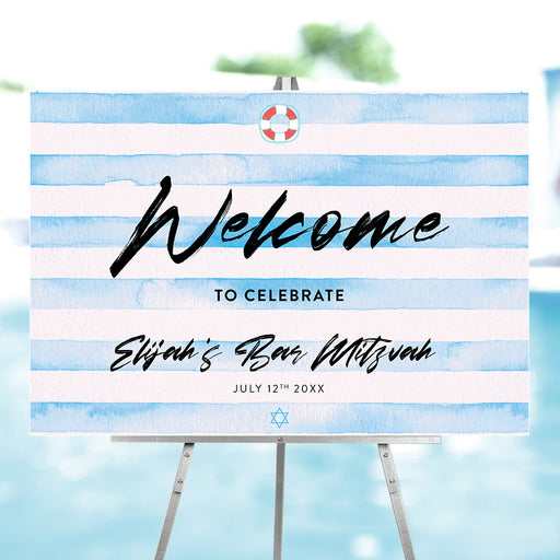 Blue Bar Mitzvah welcome sign featuring watercolor stripes with a pool party theme on a large entrance poster for a boy’s celebration