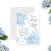 Elegant blue floral wedding invitation with botanical design