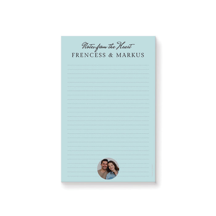 Personalized blue notepad with couple photo, lined writing pages and custom names for wedding stationery or gifts.